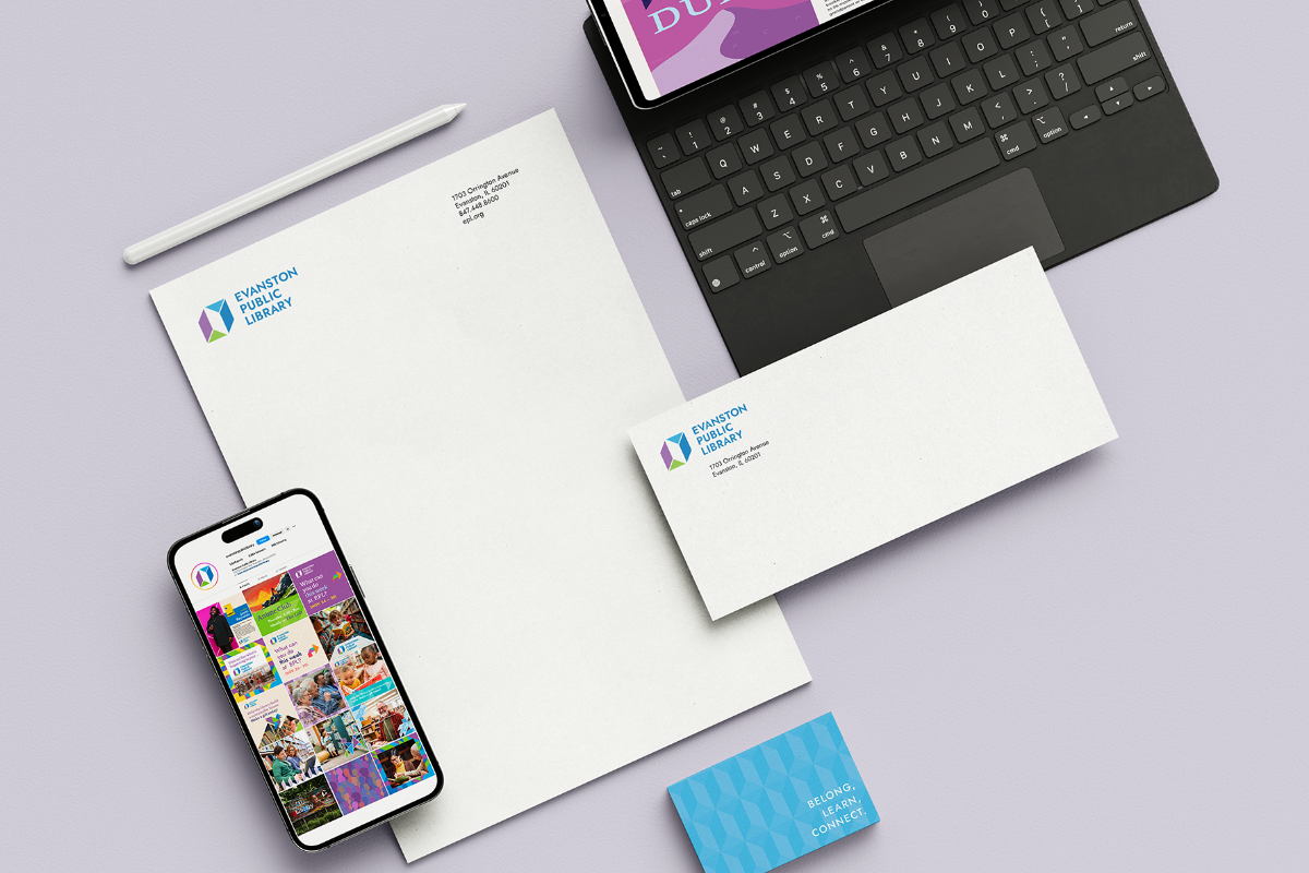 EPL branding on a laptop, phone and other print work