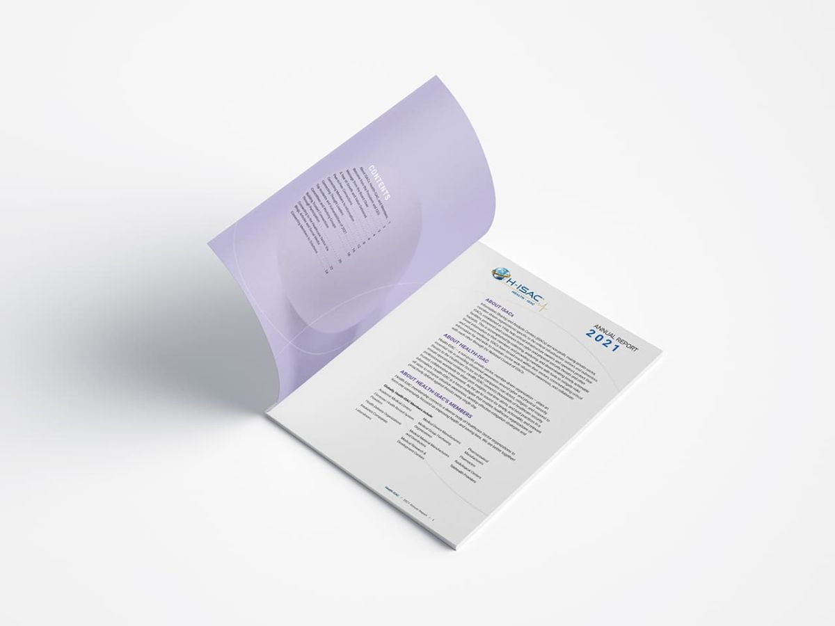 an action shot of the annual report with page flipping open